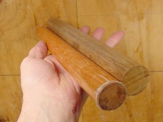 Two hardwood dowels, 12 inches long, one 1.25 inch diameter, the other 1.125 inch dia.