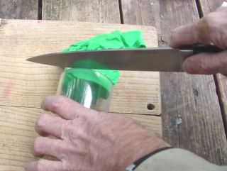 Trim excess cloth with sharp knife